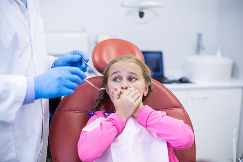 Cómo curar un flemón dental en niños